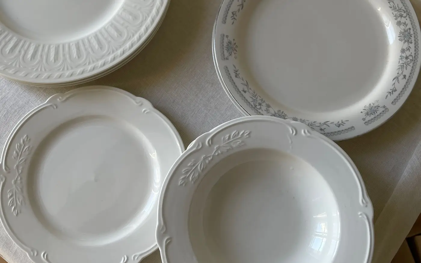 White porcelain plates with an embossed rim